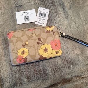 Coach Beige Wristlet with Pink and Yellow Floral Design
